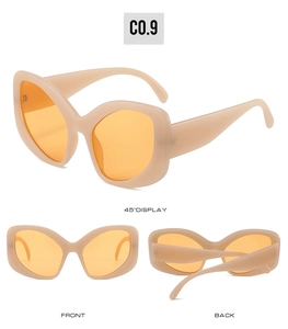 Three-way view of oversized butterfly Y2K sunglasses with beige frames and orange lenses
