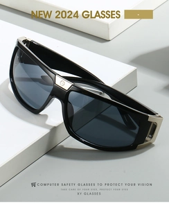 Detail of 2024 sports sunglasses with black frame and silver metallic hinge accents