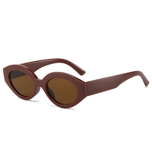 Retro burgundy oval cat-eye sunglasses with dark brown lenses and thick frames