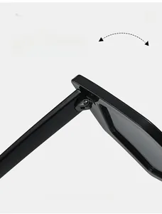 Détail macro d'une charnière en métal durable sur des lunettes de soleil œil-de-chat