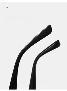 Détail des branches de lunettes noires brillantes courbées pour un confort ergonomique