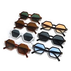 Collection of retro hexagonal sunglasses in tortoise, white, and black with tinted lenses