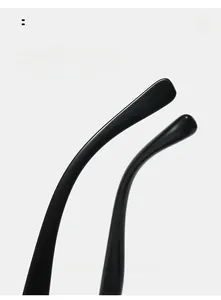 Macro shot of ergonomic black glossy sunglasses temples with curved ends for comfort