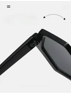 Macro shot of durable metal hinge on stylish polygonal black chunky sunglasses frame