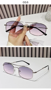 Detail of silver aviator sunglasses featuring purple gradient lenses and metal double bridge
