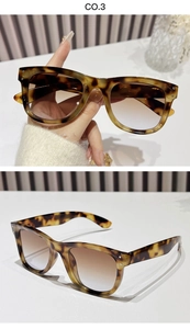 Detail of tortoiseshell square sunglasses with gradient lenses and silver metal rivets