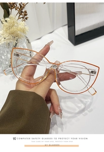 Detailed view of cat-eye anti-blue light glasses with transparent and orange resin frames