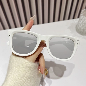 Fashionable white square sunglasses with grey lenses and decorative metal dots