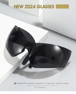 Detail view of large Y2K cat-eye sunglasses with wraparound side shield design