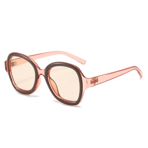 Lunettes de soleil Y2K rétro avec monture rose gelée et verres teintés orange