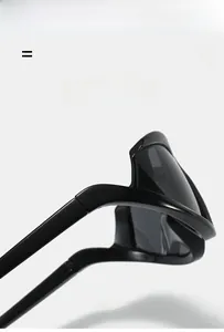 Detail view of lightweight, super elastic black cat-eye sunglasses frames with Y2K style