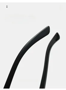 Detail of curved glossy black temple legs on Y2K cat eye sports sunglasses