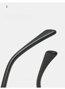 Detail view of glossy black curved mirror legs for comfortable wear on oval sunglasses