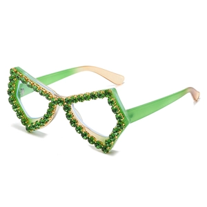 Fashionable green oversized butterfly glasses with sparkling rhinestones and gradient temples