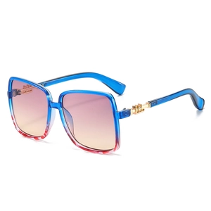Oversized square sunglasses with blue-red gradient frame and gold metal accents
