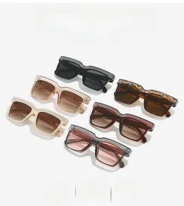 Macro detail of oversized square sunglasses featuring premium rhinestone-encrusted top frames