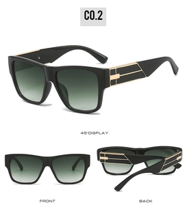Détail de lunettes de soleil carrées avec monture noire et branches en métal doré