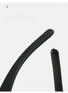 Macro detail of curved black plastic sunglasses temples for comfortable ergonomic wear