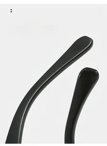 Detail view of ergonomic curved temple legs on oversized shield sunglasses