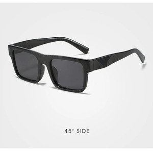 Detail shot of square sunglasses showing thick frame and geometric temple at 45 degree angle
