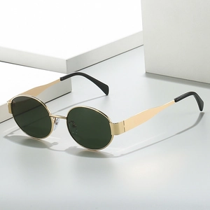 Vintage oval metal sunglasses with gold frame and dark lenses on a white pedestal