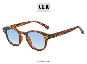 Retro round tortoiseshell sunglasses with blue lenses at 45-degree angle display