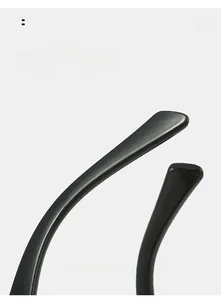 Detail of curved black sunglasses legs with arc design for comfortable daily wear