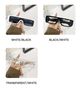 Detail of vintage square sunglasses with golden leopard metal decor on the temples
