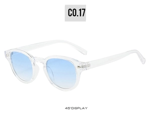 Detail view of transparent retro round sunglasses with blue gradient lenses at 45 degree angle