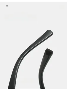 Detail of curved black glossy temple tips on these trendy retro round sunglasses