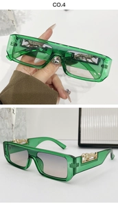 Detail of green transparent rectangle sunglasses with gold leopard metal decoration on temple