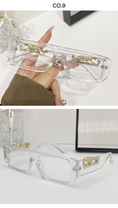Detail showing the golden panther metal ornament on transparent rectangle sunglasses