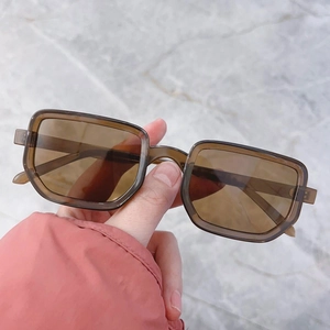 Vintage rectangle sunglasses with transparent brown resin frame and matching tinted lenses