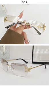 Detail of rimless sunglasses with butterfly diamond accents and brown gradient lenses