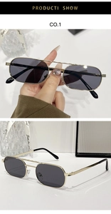 Detailed view of vintage gold metal double bridge sunglasses with dark square lenses