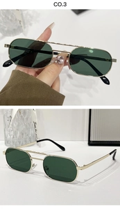 Detail view of retro double bridge metal frame sunglasses with dark green square lenses