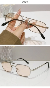 Detail of silver double bridge sunglasses with light pink lenses and black temple tips
