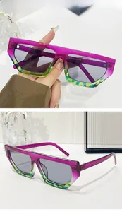 Detail of diamond frame sunglasses with purple-green gradient and leopard print texture