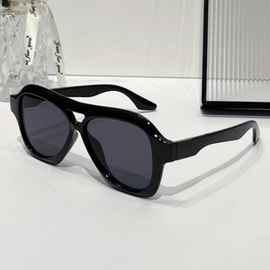 Classic black aviator sunglasses for women with deep gray lenses and double bridge design