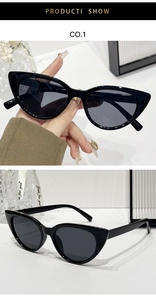 Close-up of black cat-eye sunglasses with detailed lens size 52-19-143 on a gift ribbon