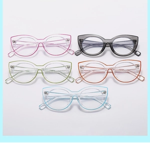 Macro view of five colorful transparent cat-eye glasses frames with metal hinges