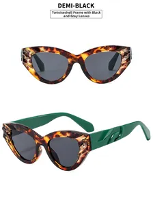 Cat eye sunglasses detail with tortoiseshell frame and 3D textured green temples