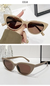 Detail view of khaki cat-eye sunglasses featuring brown lenses and sleek slim temples