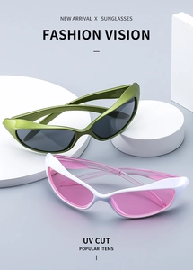 Detail of olive green and white cat-eye sunglasses with UV protection on geometric stands