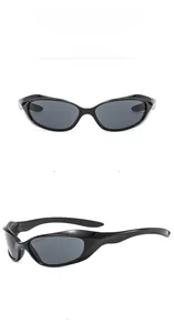 Front and side view of Y2K punk style black wraparound sunglasses with gray lenses
