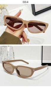 Detail view of light coffee cat eye sunglasses with high-quality polished frames