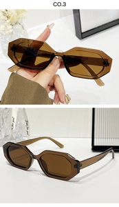 Détail de lunettes de soleil octogonales vintage marron ambre avec branches larges
