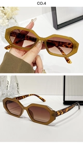 Détail de lunettes de soleil géométriques écaille avec verres dégradés marron et monture