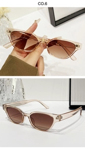 Détails de lunettes de soleil yeux de chat vintage avec monture café et verres dégradés