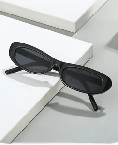 Detail of vintage black narrow frame cat eye sunglasses with UV protection lenses